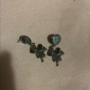 Saddle Shaped Dangle Silver Earrings